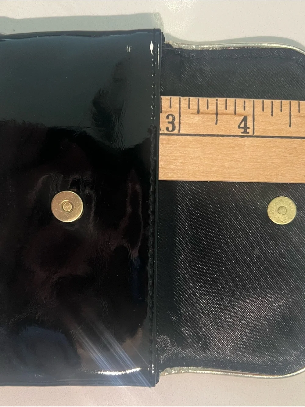 YSL beauty Black glossy pouch.